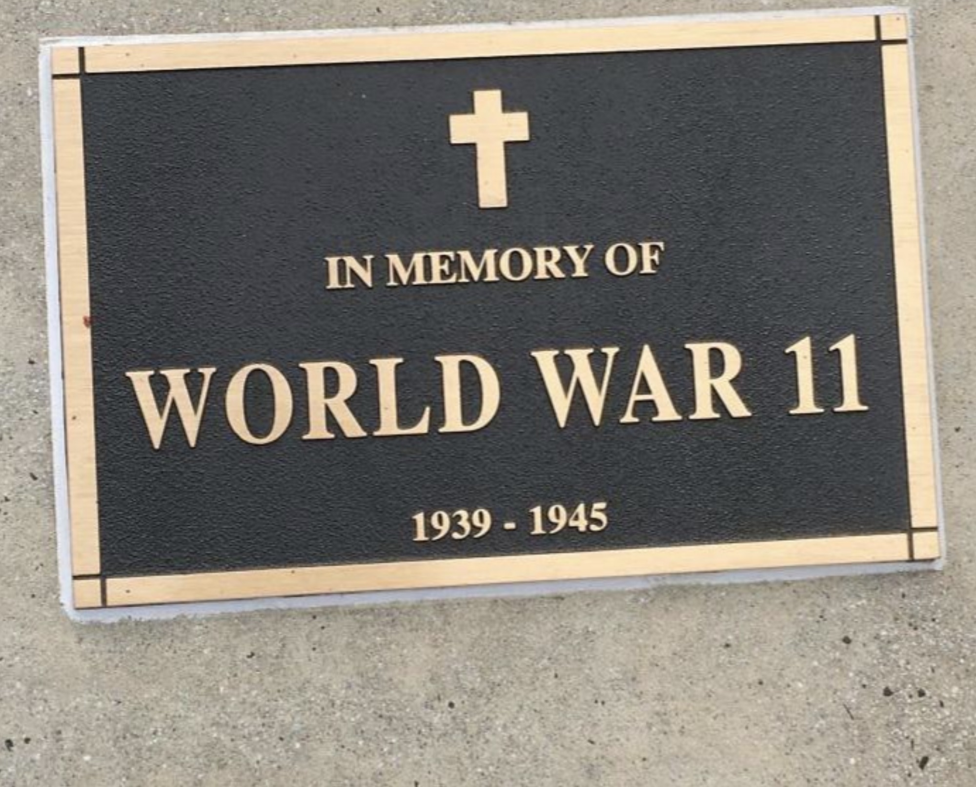 badly designed signs - In Memory Of World War 11 19391945